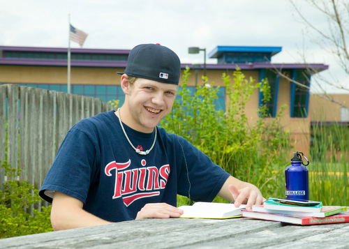 student outside studying