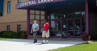 Two male students walk outside of CLC.