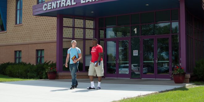 Two male students walk outside of CLC.