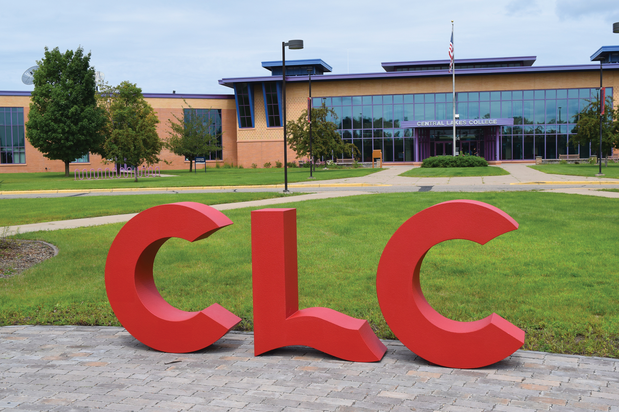 Red etters "CLC" on south lawn of campus