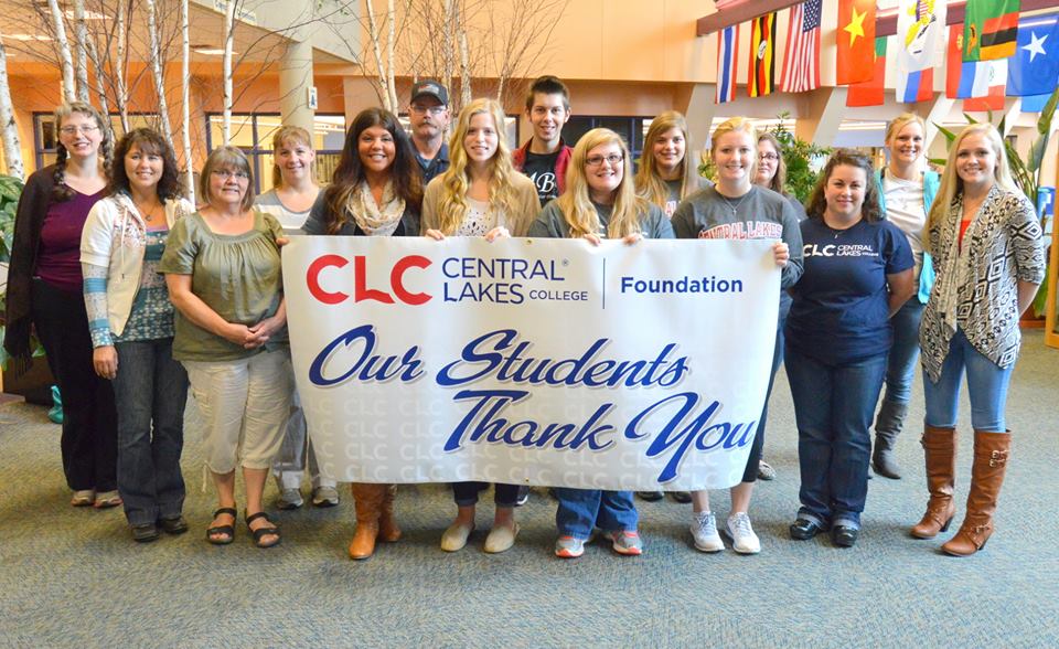 students holding banner