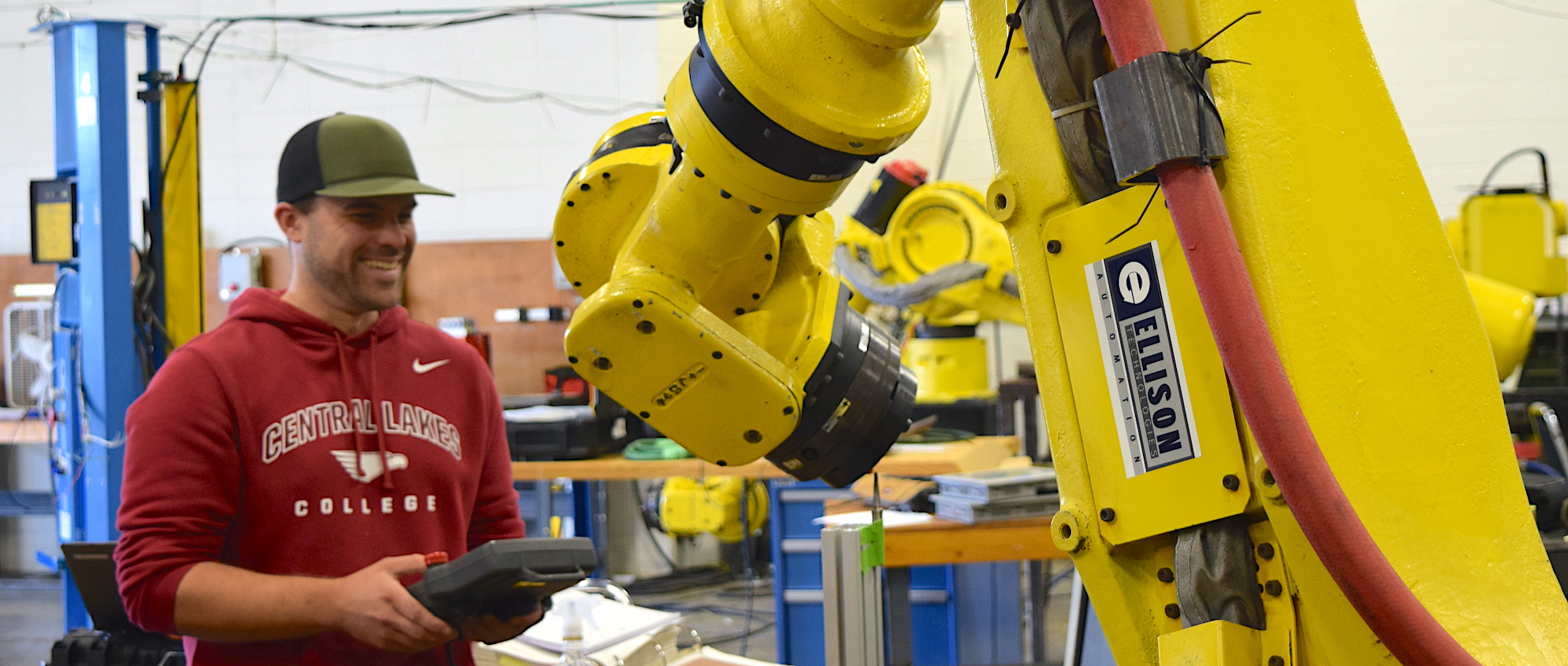 student operating robotics