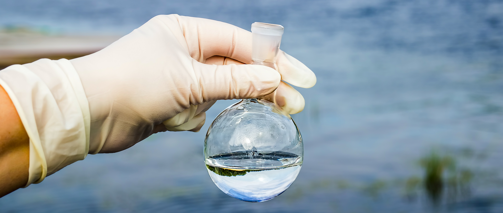 A water sample from the river. Water intake. Water abstraction. Water diversion.